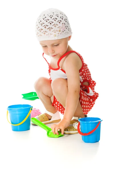 Cute baby with bucket and spade — Stock Photo, Image