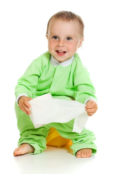 Niño en el orinal jugar con papel higiénico —  Fotos de Stock