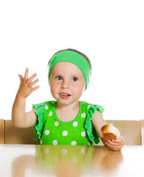 Pretty little girl eats bread — Stock Photo, Image