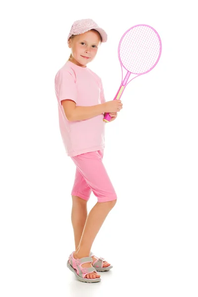 Liten flicka med spelar tennis — Stockfoto