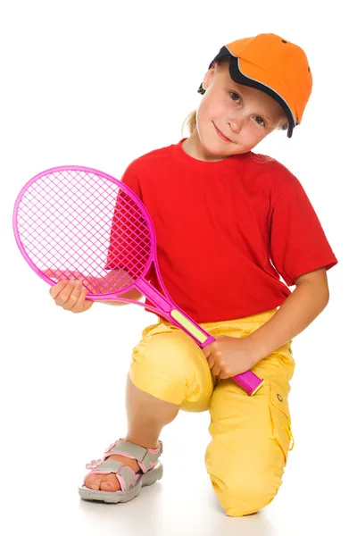 Liten flicka med spelar tennis — Stockfoto