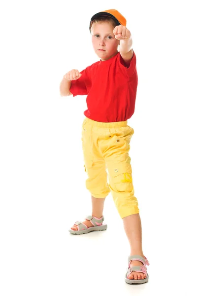 Little child threatens with a fist — Stock Photo, Image