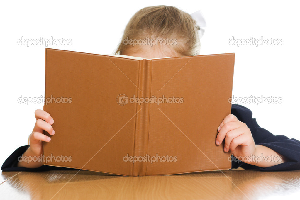 schoolgirl is hiding behind a book
