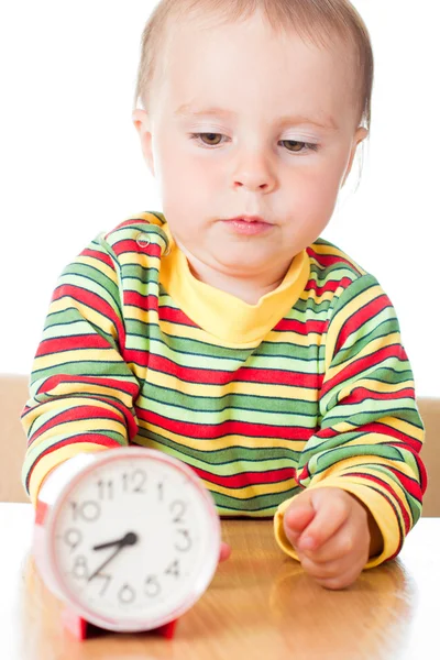 Little cute baby with clock — Stock Photo, Image