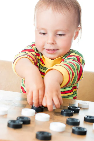 Niño jugando damas . —  Fotos de Stock