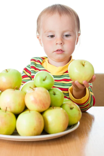 Baby eating apple — Stock Photo, Image