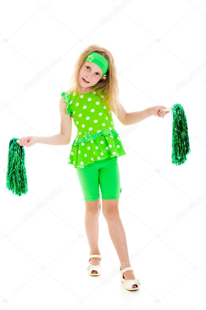 The girl in green with pompoms.