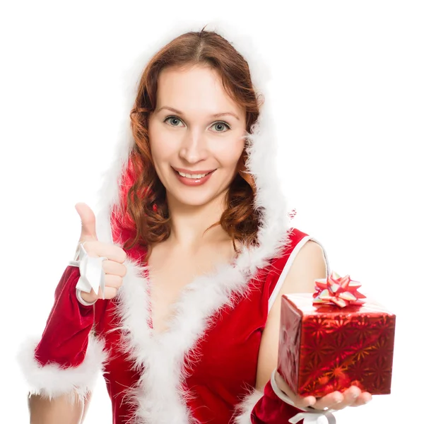 Ευτυχισμένος κορίτσι σε ένα φόρεμα χριστουγεννιάτικα δείχνει εντάξει σημάδι — Φωτογραφία Αρχείου