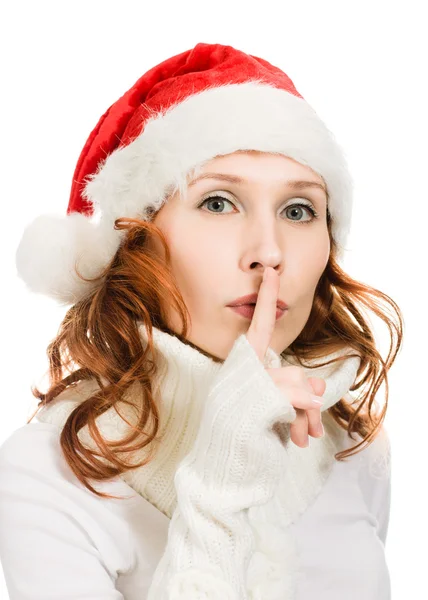 Happy Christmas woman points to the silence — Stock Photo, Image