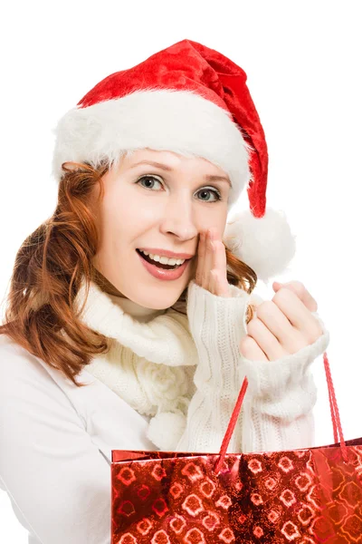 Schöne Weihnachtsfrau mit Weihnachtsmütze — Stockfoto