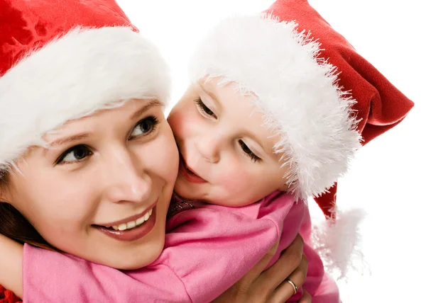 Gelukkig Kerstmis dochter kussen moeder — Stockfoto