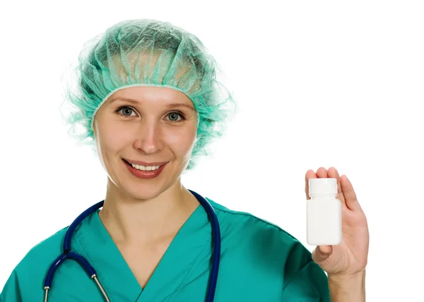 Woman doctor holding a bottle of medicine — Stock Photo, Image