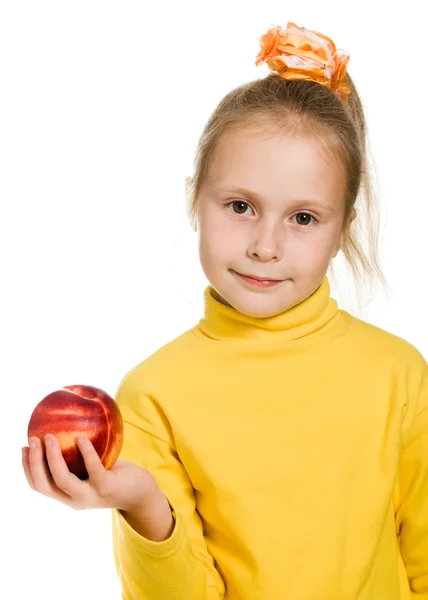 Cute girl with an apple in his hand — Stock Photo, Image