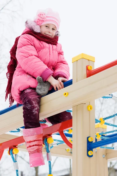 Beautiful happy kid in the red jacket — Stock Photo, Image