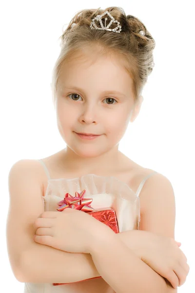 Chica bonita en un hermoso vestido con regalo — Foto de Stock