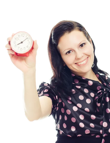 Hermosa mujer sosteniendo un reloj  . — Foto de Stock