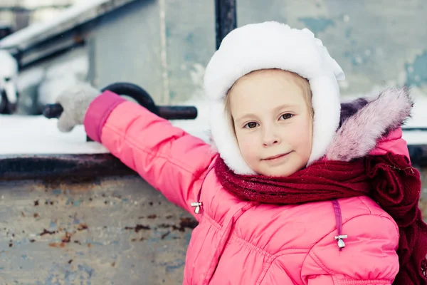 Beautiful happy kid in the red jacket — Stock Photo, Image