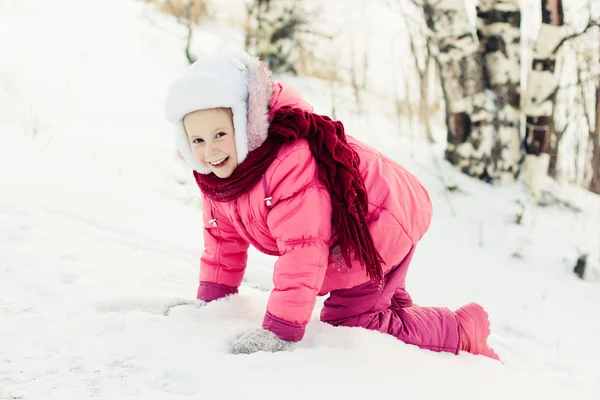 Beautiful happy girl in the red jacket — Stock Photo, Image