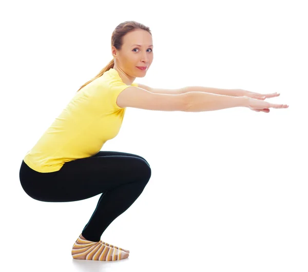 Jovem mulher fazendo exercício de ioga — Fotografia de Stock