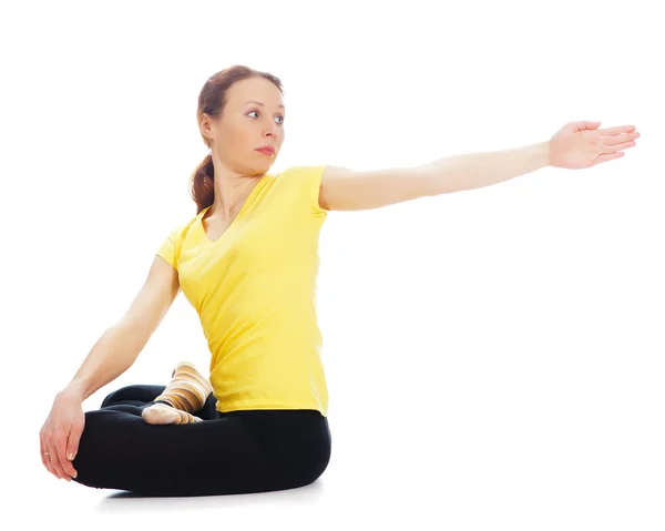 Jovem mulher fazendo exercício de ioga — Fotografia de Stock