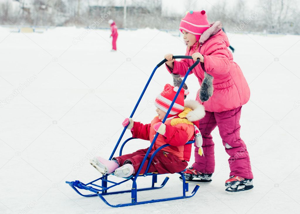 Happy children in winter outdoors