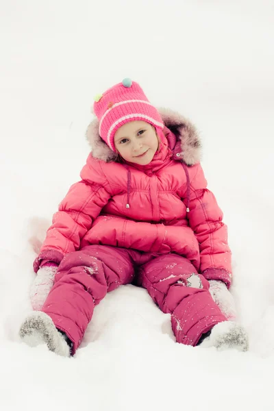 Beautiful happy girl in the red jacket — Stock Photo, Image