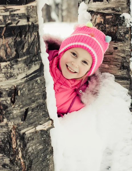 Beautiful happy girl in the red jacket — Stock Photo, Image