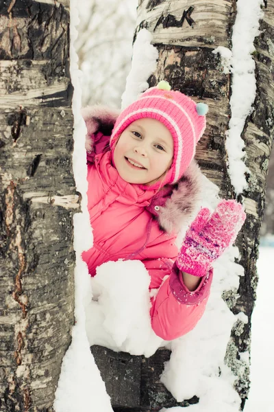 Beautiful happy girl in the red jacket — Stock Photo, Image