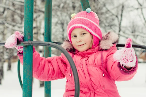 Beautiful happy kid in the red jacket — Stock Photo, Image