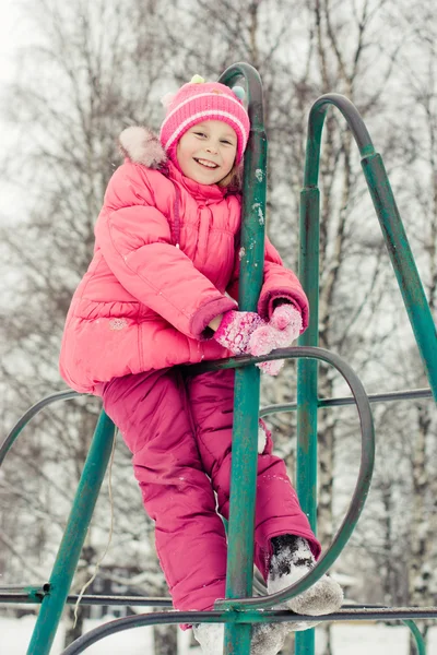 Beautiful happy kid in the red jacket — Stock Photo, Image