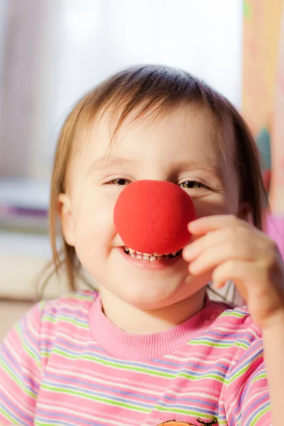 Kid with red nose — Stock Photo, Image