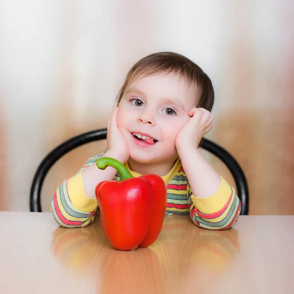 Happy Kid with red pepper — Stock Photo, Image