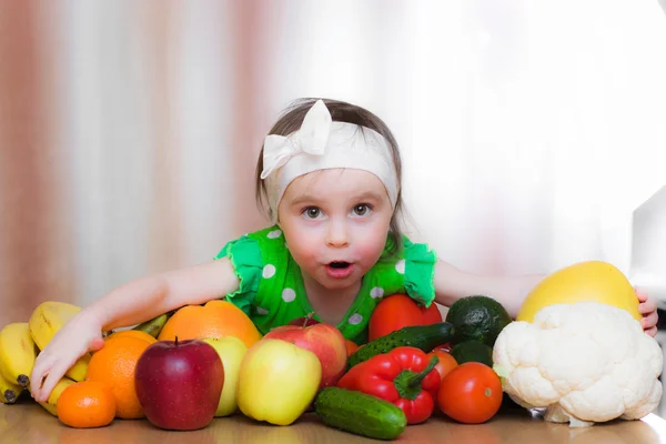 Happy Kid with vegetables and fruits. — Stock Photo, Image