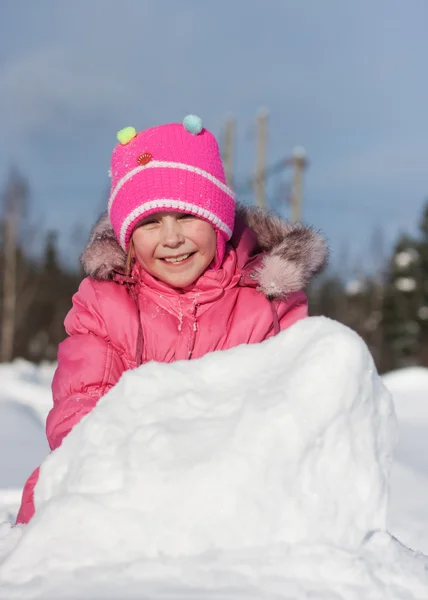 Beautiful happy kid in the red jacket — Stock Photo, Image