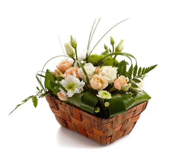 Basket with beautiful flowers isolated — Stock Photo, Image