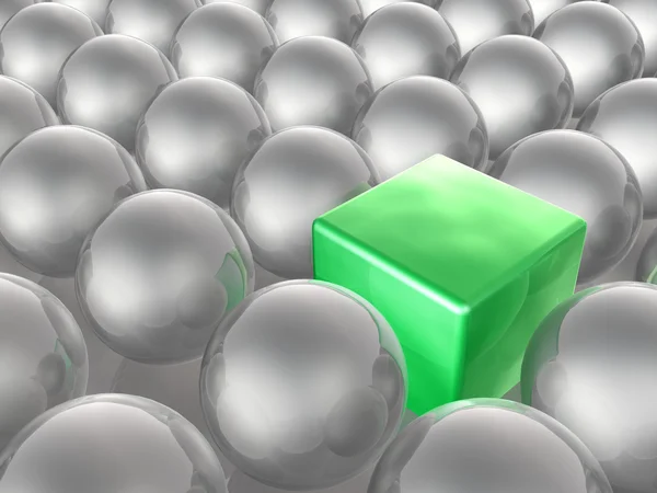 Green cube and grey spheres — Stock Photo, Image