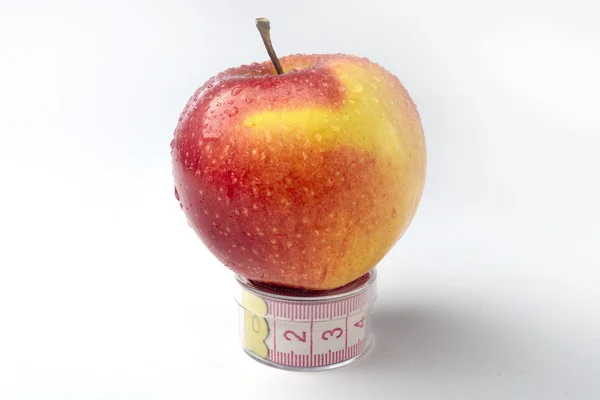 Apple с лентой — стоковое фото