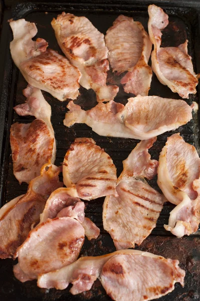Rashers of delicious grilled bacon — Stock Photo, Image