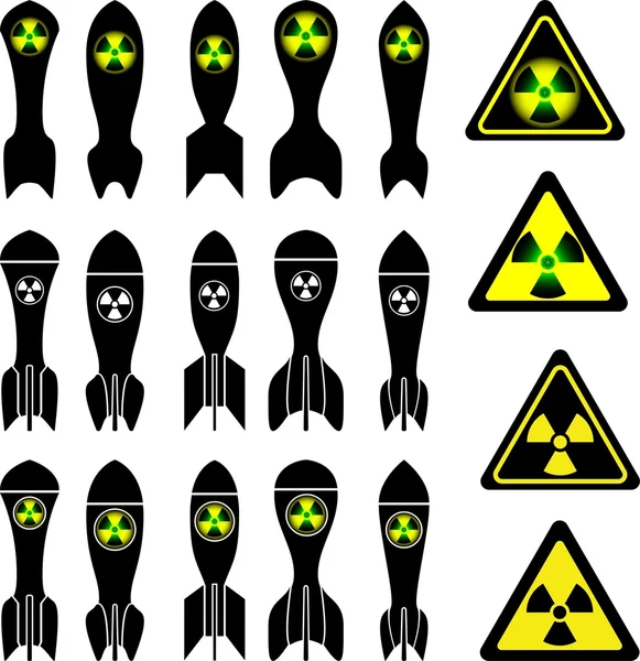 Set of atomic bombs and radiation signs — Stock Vector