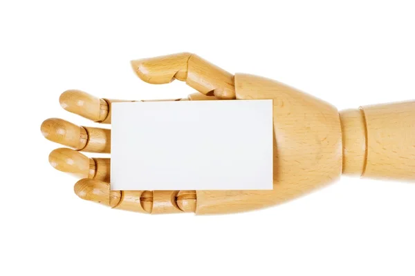 Дерев'яна, людська рука з білою карткою ізольована на білому тлі — стокове фото