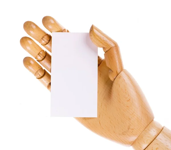 Fából készült, emberi kéz fehér kártya elszigetelt fehér background — Stock Fotó
