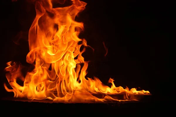 Fire on a black background — Stock Photo, Image