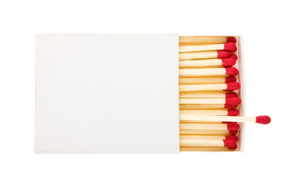 Red matches in a white box isolated on a white background. — Stock Photo, Image