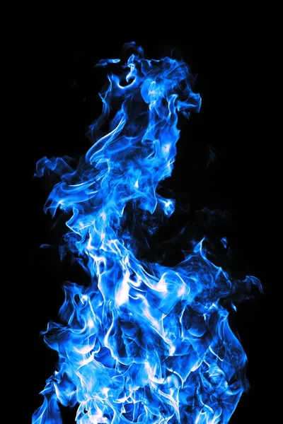 Синій вогонь на чорному фоні Стокове Зображення