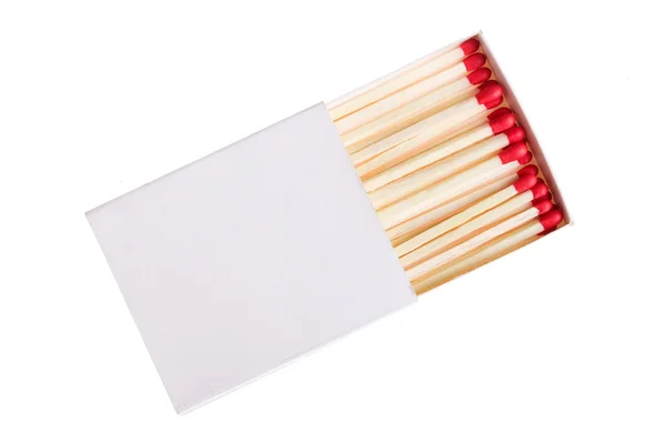 Piros mérkőzések egy fehér doboz elszigetelt fehér background. Stock Fotó