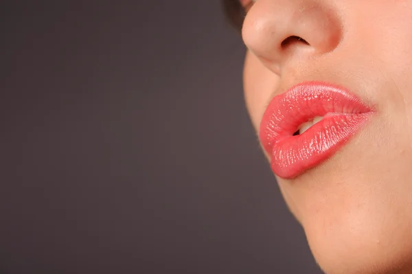 Lábios vermelhos da mulher — Fotografia de Stock
