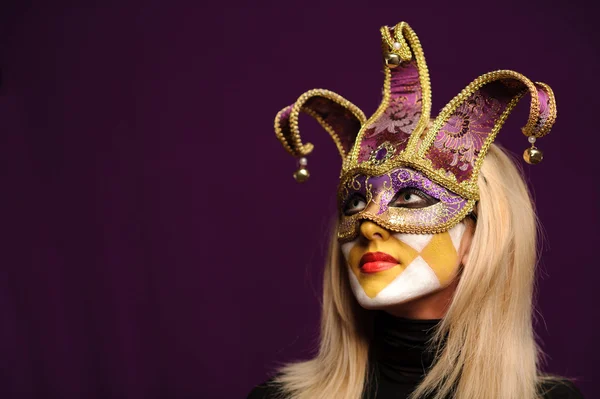 Woman in violet party mask — Stock Photo, Image