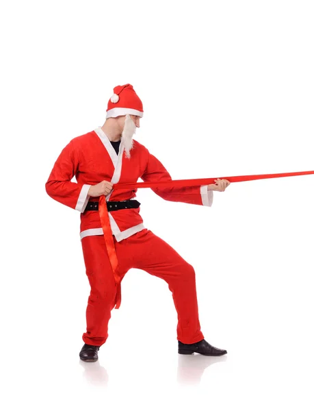 Santa Claus pull red ribbon — Stock Photo, Image