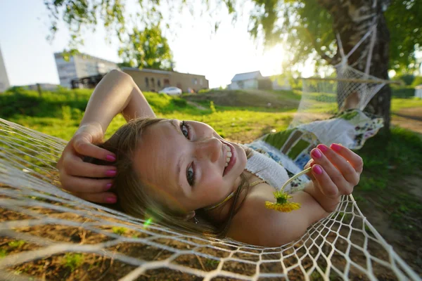 Woman on hammock in the park — Stock Photo, Image