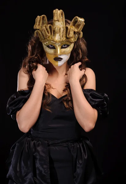 Woman in golden mask — Stock Photo, Image